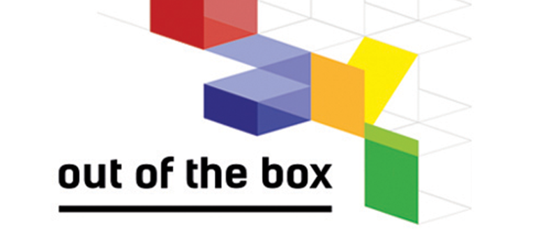 A multicoloured geometric construction with the text: "Out of the Box"