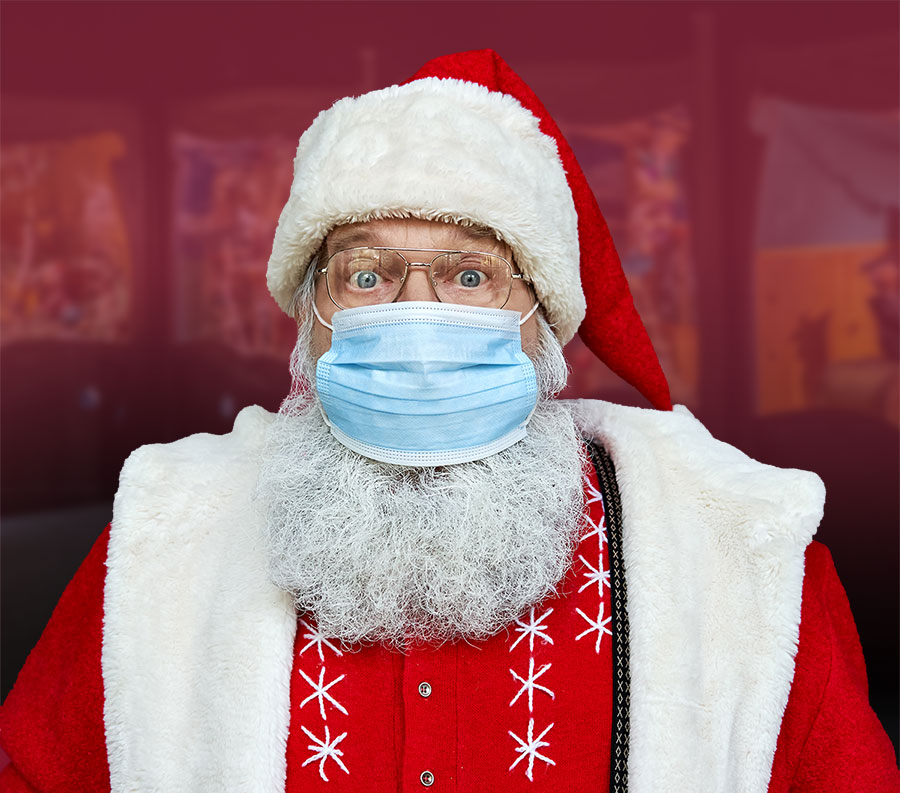 Photo of Santa Claus wearing a protective face mask