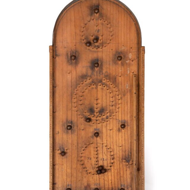 Image of a traditional bagatelle board on a plain white background